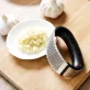   Fokhagymanyomó, fokhagymaprés, fokhagymatörő (rozsdamentes acélból)